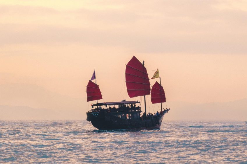 red sail junk boat in Hong Kong