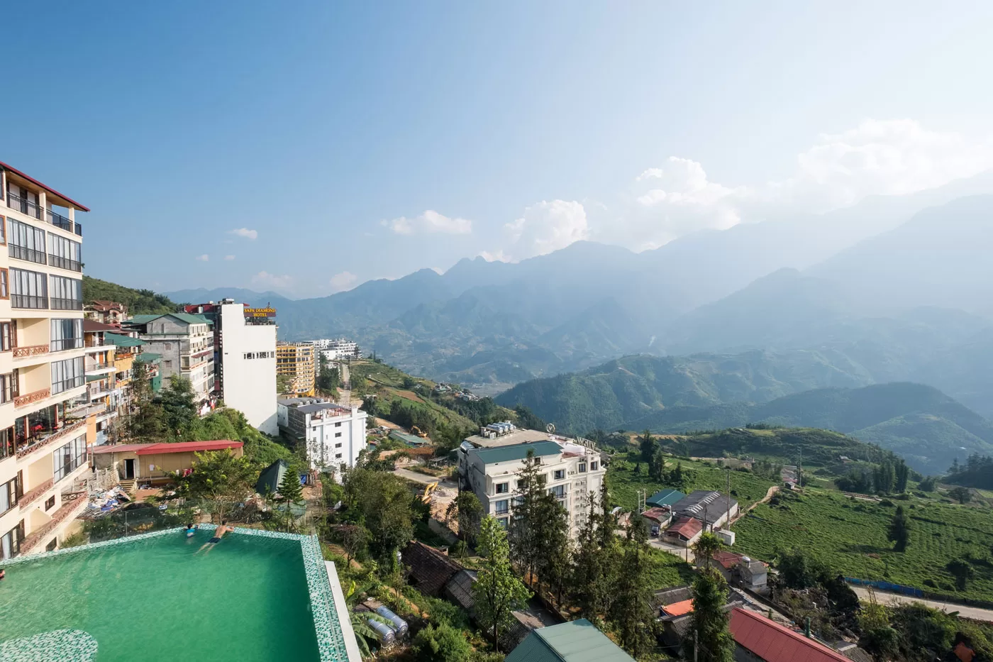 Bamboo Sapa Hotel pool with mountain view